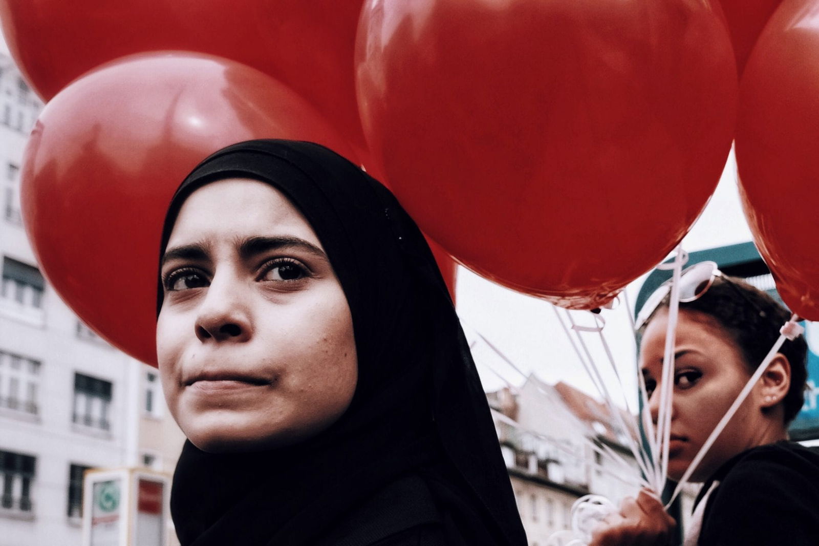 portrait of a woman, street photography of a person, by efi logginou