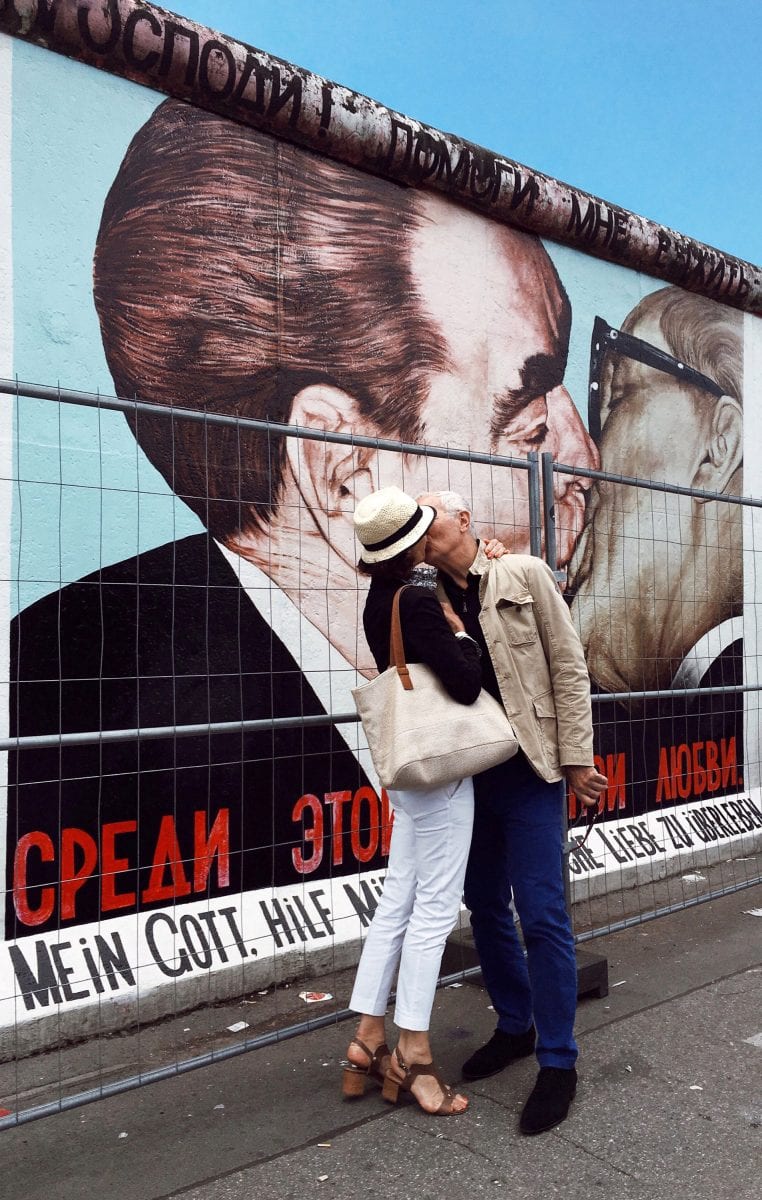 couple kissing in berlin street photography of a person, by efi logginou