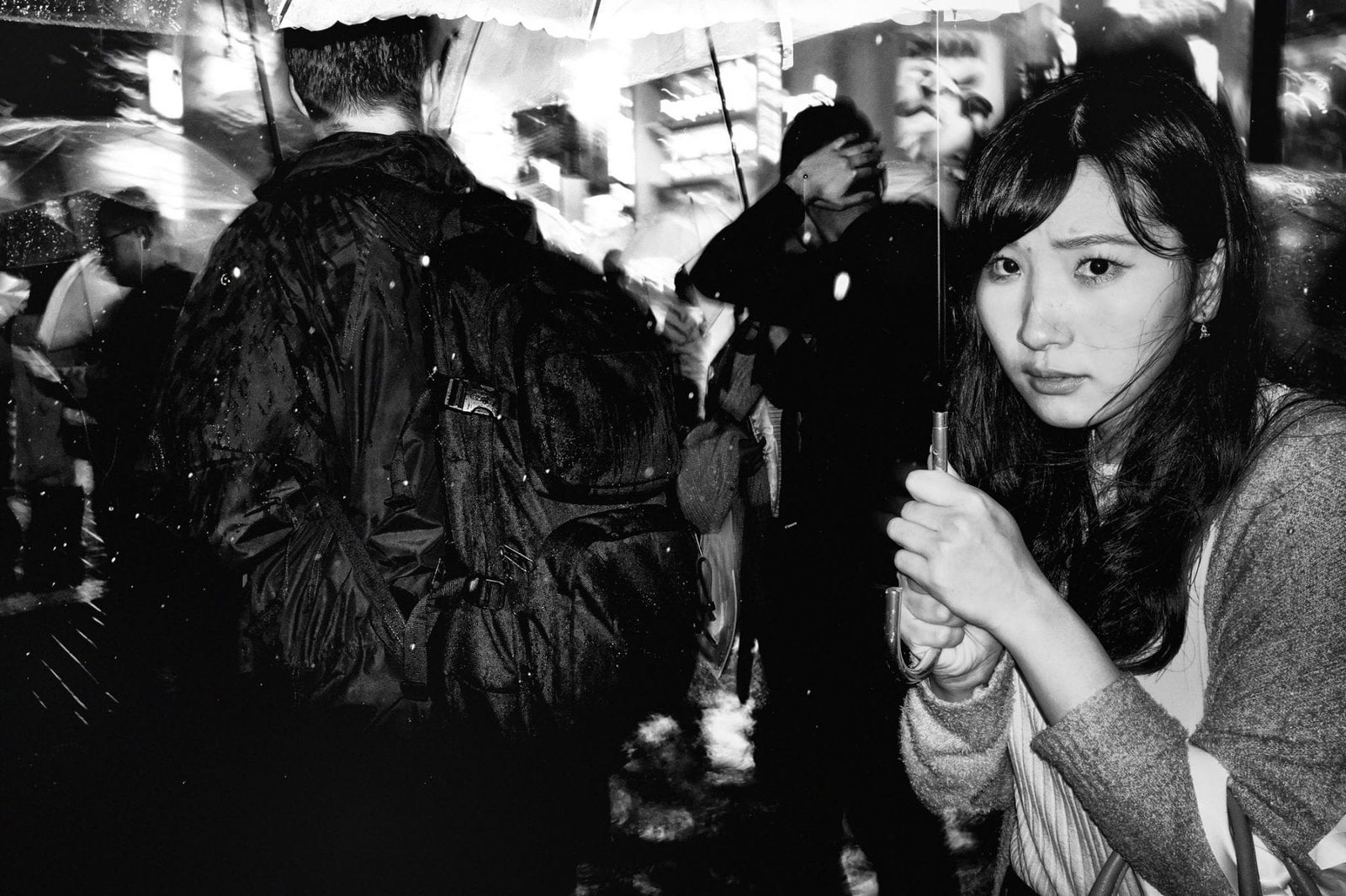 black and white close up portrait of a girl by Tatsuo Suzuki