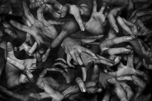 black and white photography of human bodies on a dark background by Korean Photographer Dongwook Lee