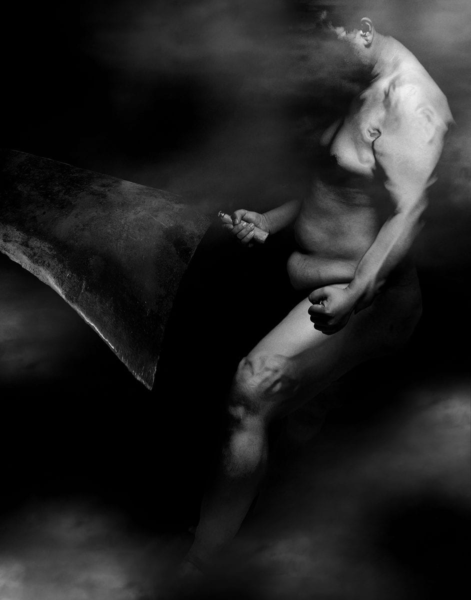 black and white photography of human bodies on a dark background by Korean Photographer Dongwook Lee