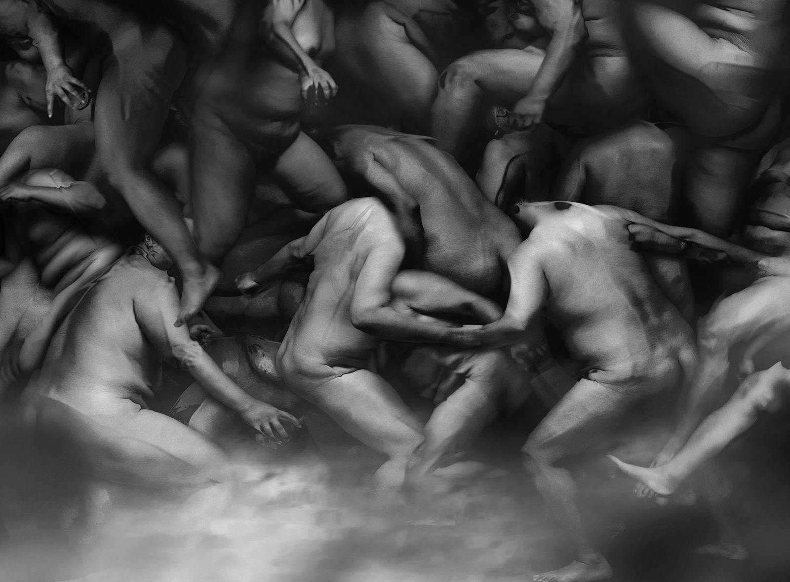 black and white photography of human bodies on a dark background by Korean Photographer Dongwook Lee