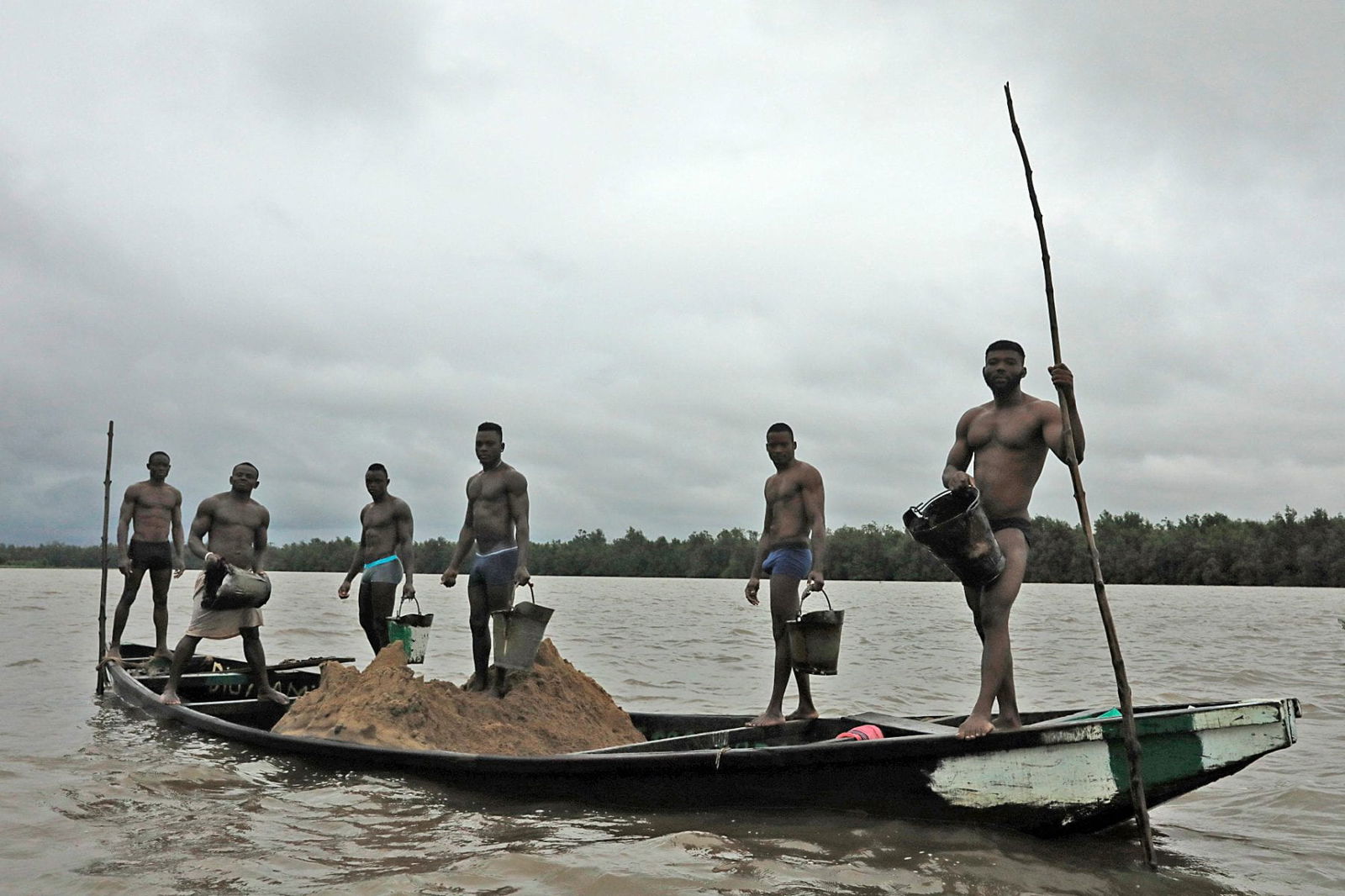 men standing documentary photography in color by Hugh Brown