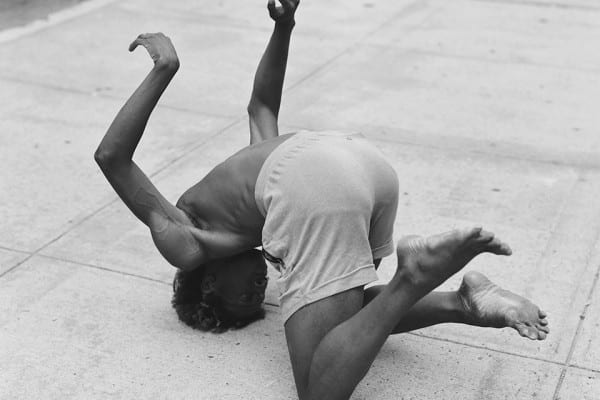 Black and white film portrait photograph of a man in the street by Alexander Klang