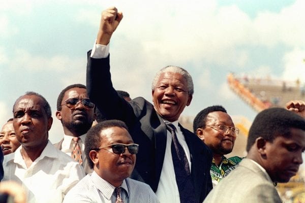 Nelson Mandela arrives for his first election rally, Mmabatho, South Africa, March 15, 1994