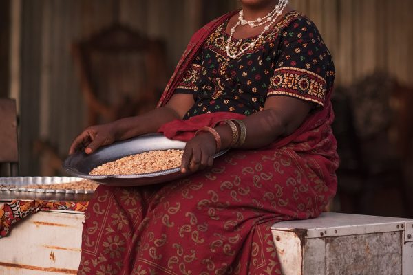 Travel photograph and portrait of a woman in Comoros by Djamil Kemal