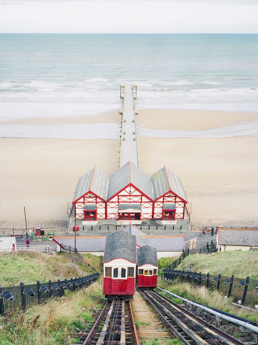 Travel photograph by Frank Lassak of the beach and Saltburn Pier, United Kingdom