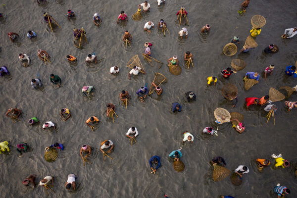 aerial color photograph of people fishing in Bangladesh