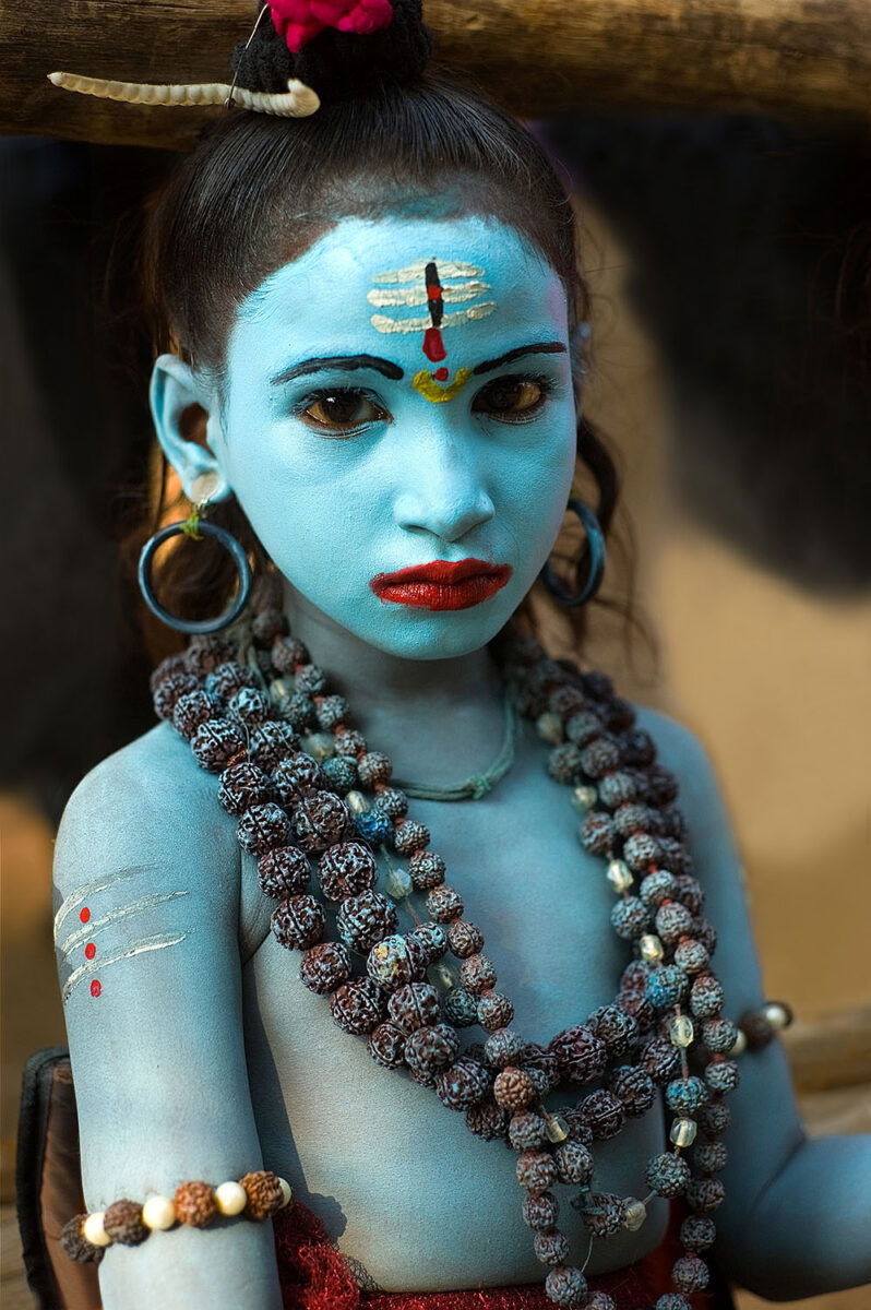 visual story award - - color portrait of a young child dressed as the god Shiva by Sandra Chen Weinstein