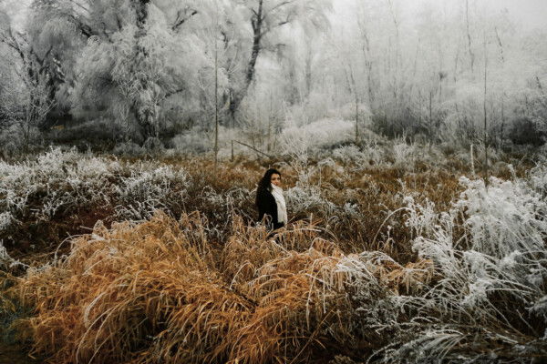 Documentary photography by Tomislav Marcijuš, portrait of a girl in winter landscape, from the series Baranja Dreaming