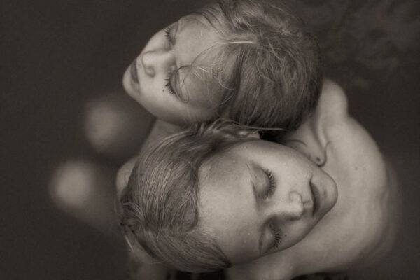 black and white portrait photo of two children by Renee Johnstone