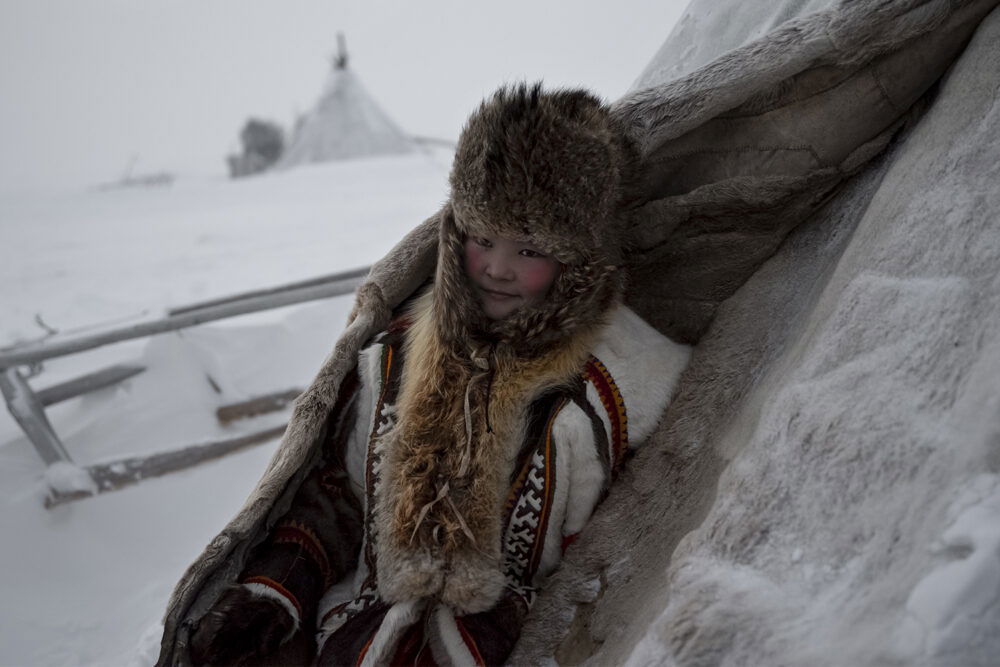 documentary portrait of a young nenet in front of her chum by Sara Bardotti