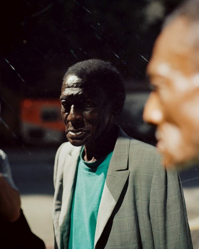 Street photography, a man in a suit jacket by Gregory Halpern