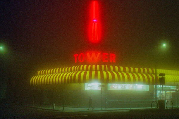 color night photo of neon street corner in San Francisco, California by Joshua Singh