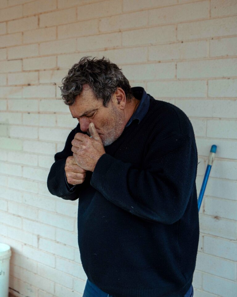 Documentary photography by Mattia Panunzio. Portrait of a miner smoking