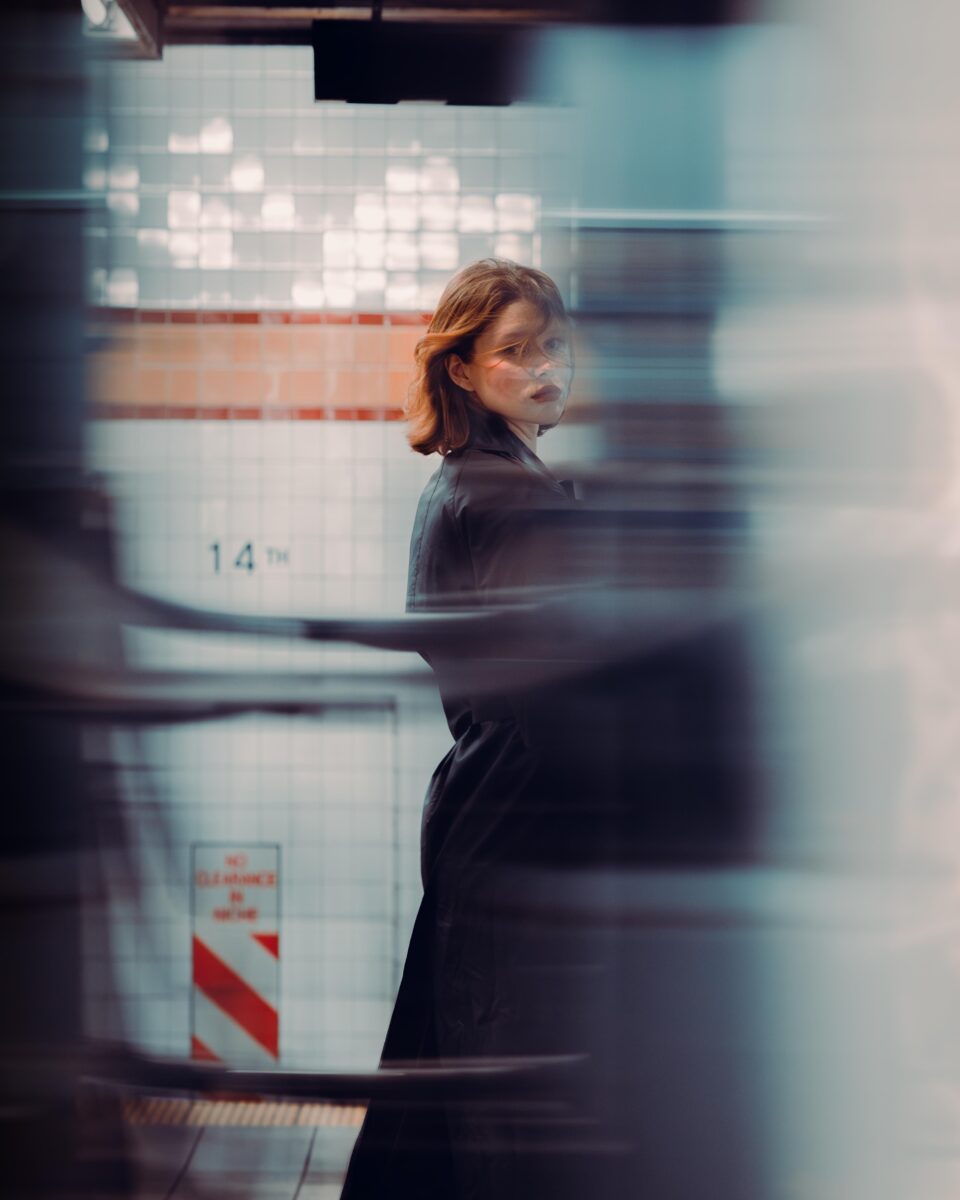 color street photo portrait of woman in New York subway by Billy Dinh