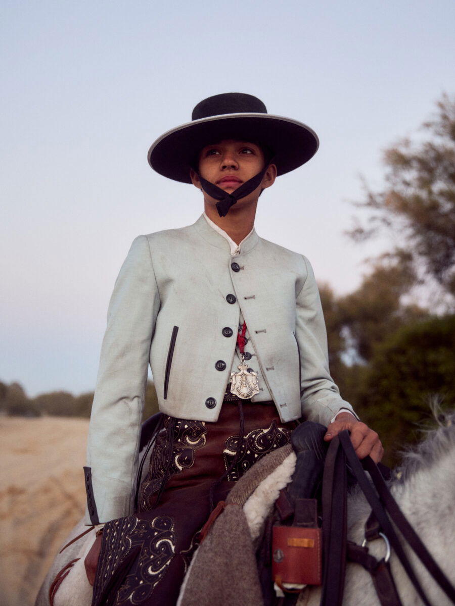 color portrait of boy rider in andalucia by Leon Foggitt