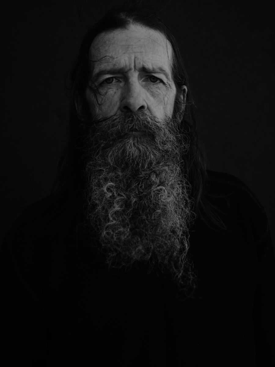 black and white portrait of man with beard by Joao Corredor