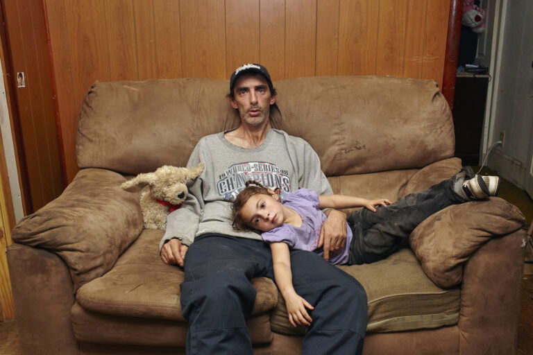 Portrait of a man and his young stepdaughter by Brenda Ann Kenneally