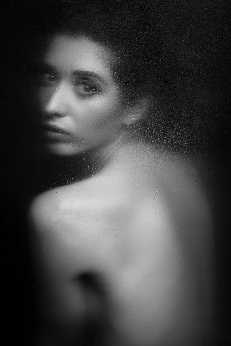 black and white fine art studio portrait of woman by Luca Onnis