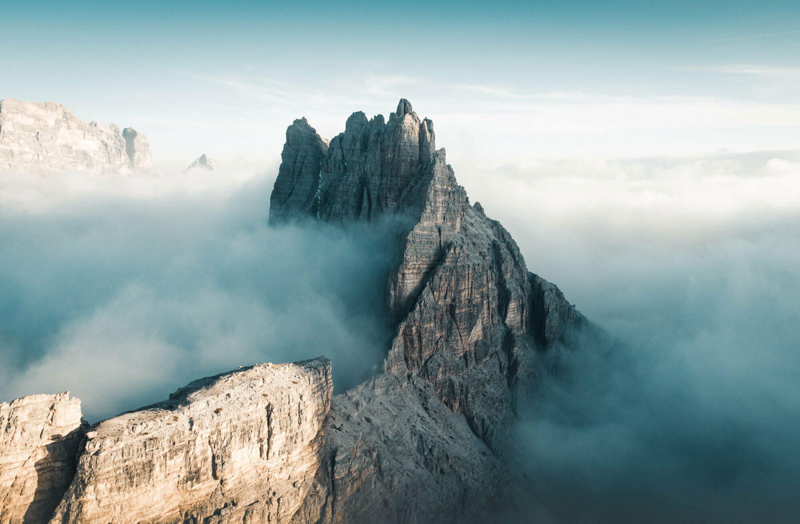 Landscape photography by Tobias Hägg. Cloud covered mountains, Dolomites, Italy