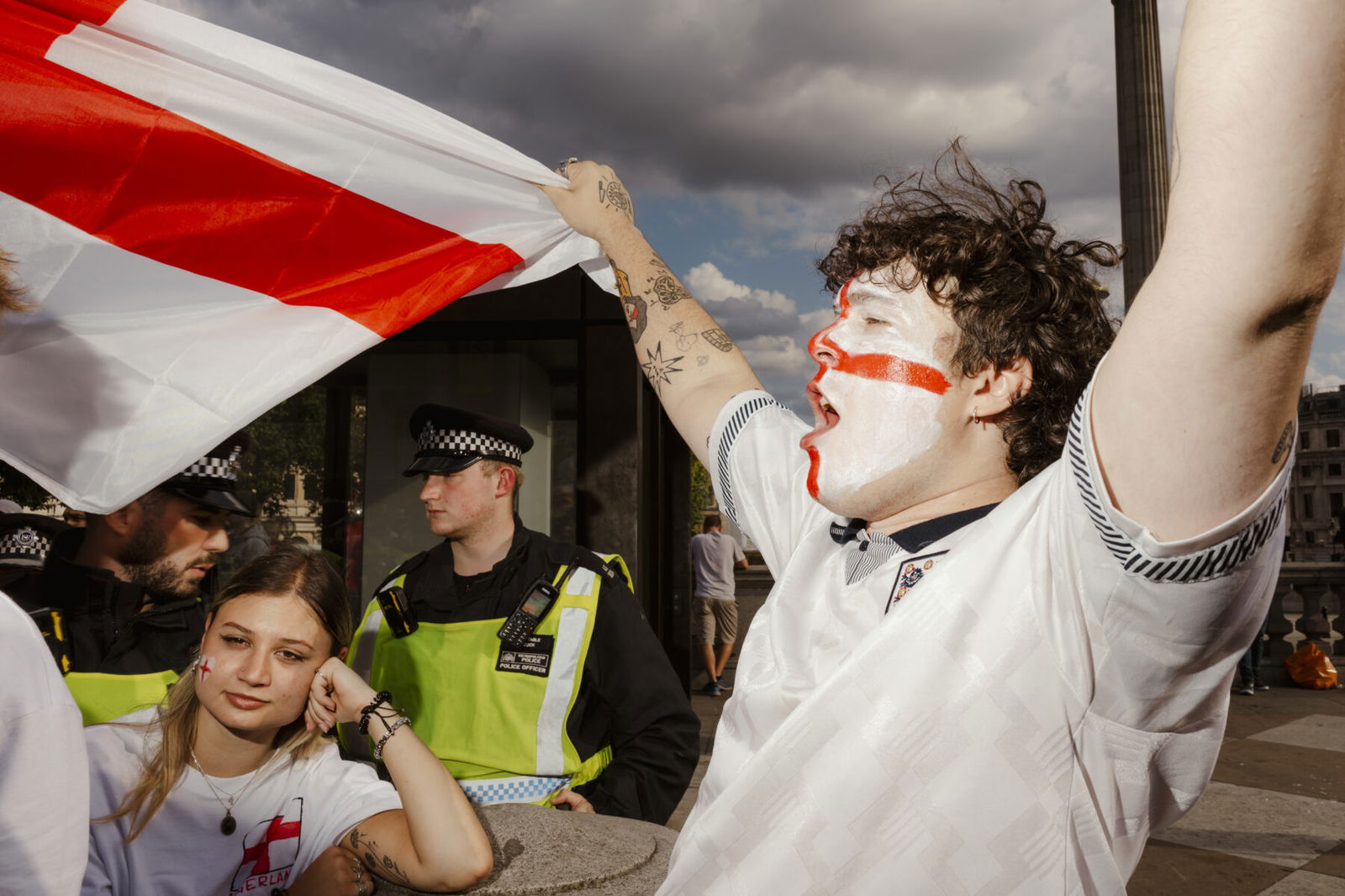 color street photo of england football supporters during euro 2024 in Trafalgar square, London, by Ethan Parker