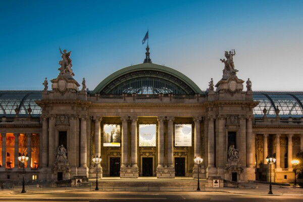 Photo of the exterior of the Grand Palais, Paris at night