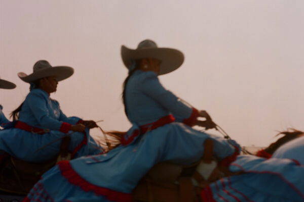 Photo by Constance Jaeggi. Photo of female, Mexican 'Escaramuza' horse riders.