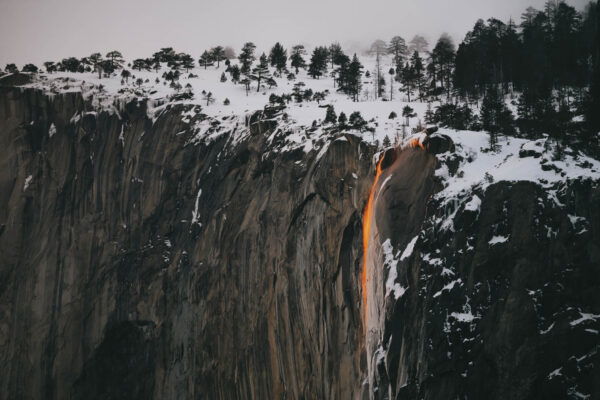 color landscape photo of firefall in Yosemite, california by Shaun Wolfe