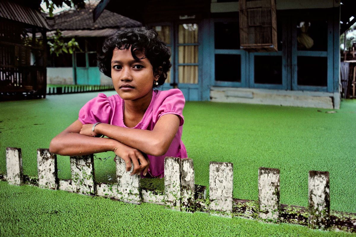 color portrait photo of a girl in Bojonegoro, Java, Indonesia, 1983 by Steve McCurry