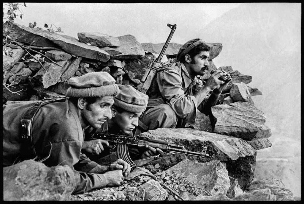 black and white photo of soldiers in Nuristan, Afghanistan, 1979 by Steve McCurry