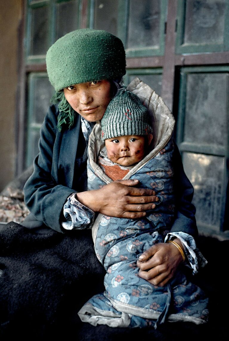 color portrait photo of Tibetan Mother and Baby, 1989 by Steve McCurry