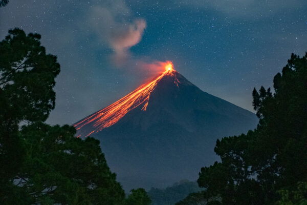 color landscape photo of volcano erupting in Guatemala by Christian Hartmann