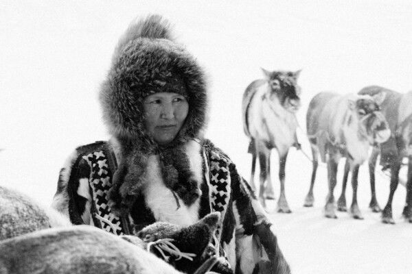 black and white portrait photo of woman with reindeer in Yamal Peninsula, Russia by Kate Surzhok